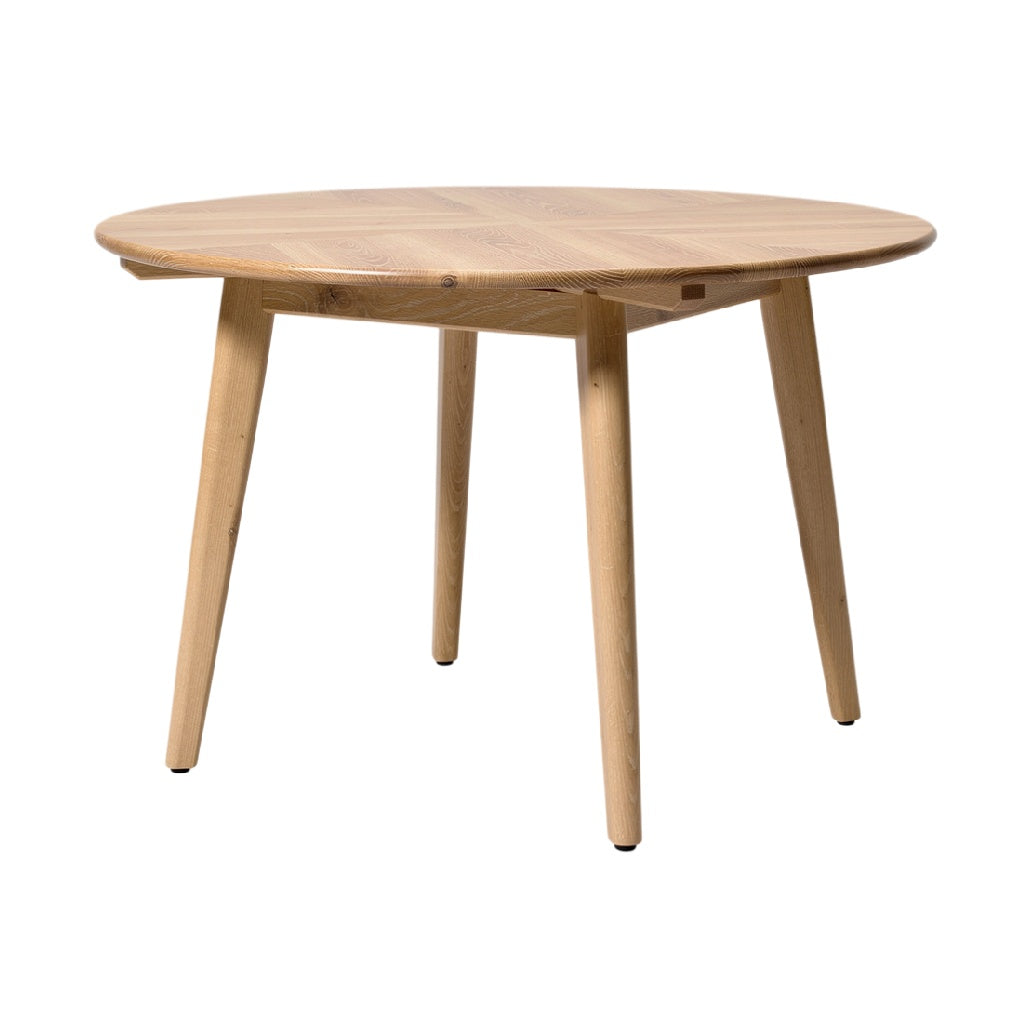 Modern Round Wooden Dining Table with Natural Finish and Sleek Legs